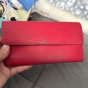 Louis Vuitton Textured Red Clutch